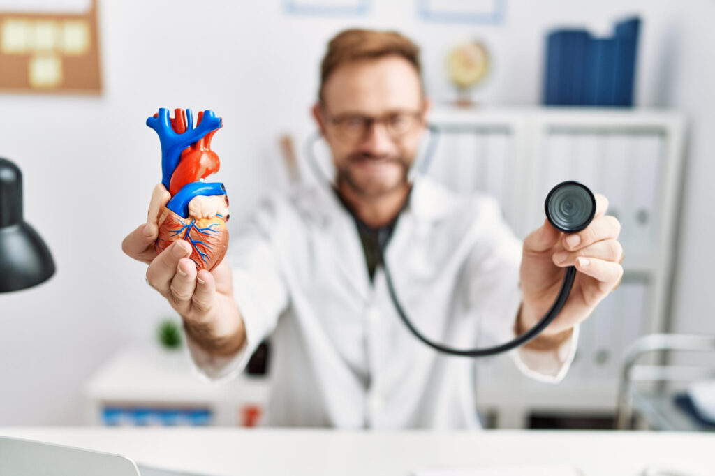 Illustration of a healthy heart with exercise icons representing physical activity and heart health.